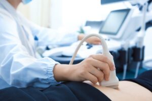 gynecologist doing Ultrasound exam