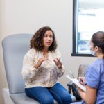 Female patient talks to the Gynecologist