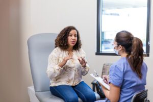 Female patient talks to the Gynecologist