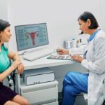 Doctor and woman patient is talking in gynecological office